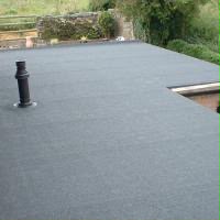 Completed flat roof above a residential property